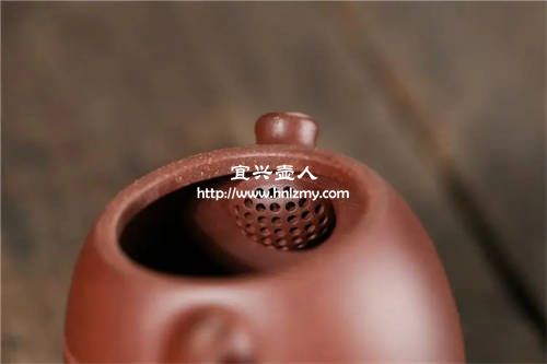 球形出水孔的紫砂壺是不是手工壺