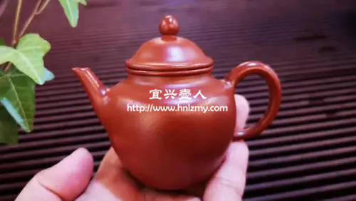 很亮很紅的紫砂壺是假的嗎