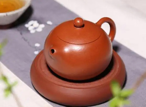 朱泥做的紫砂壺出來后什么樣的色最好2